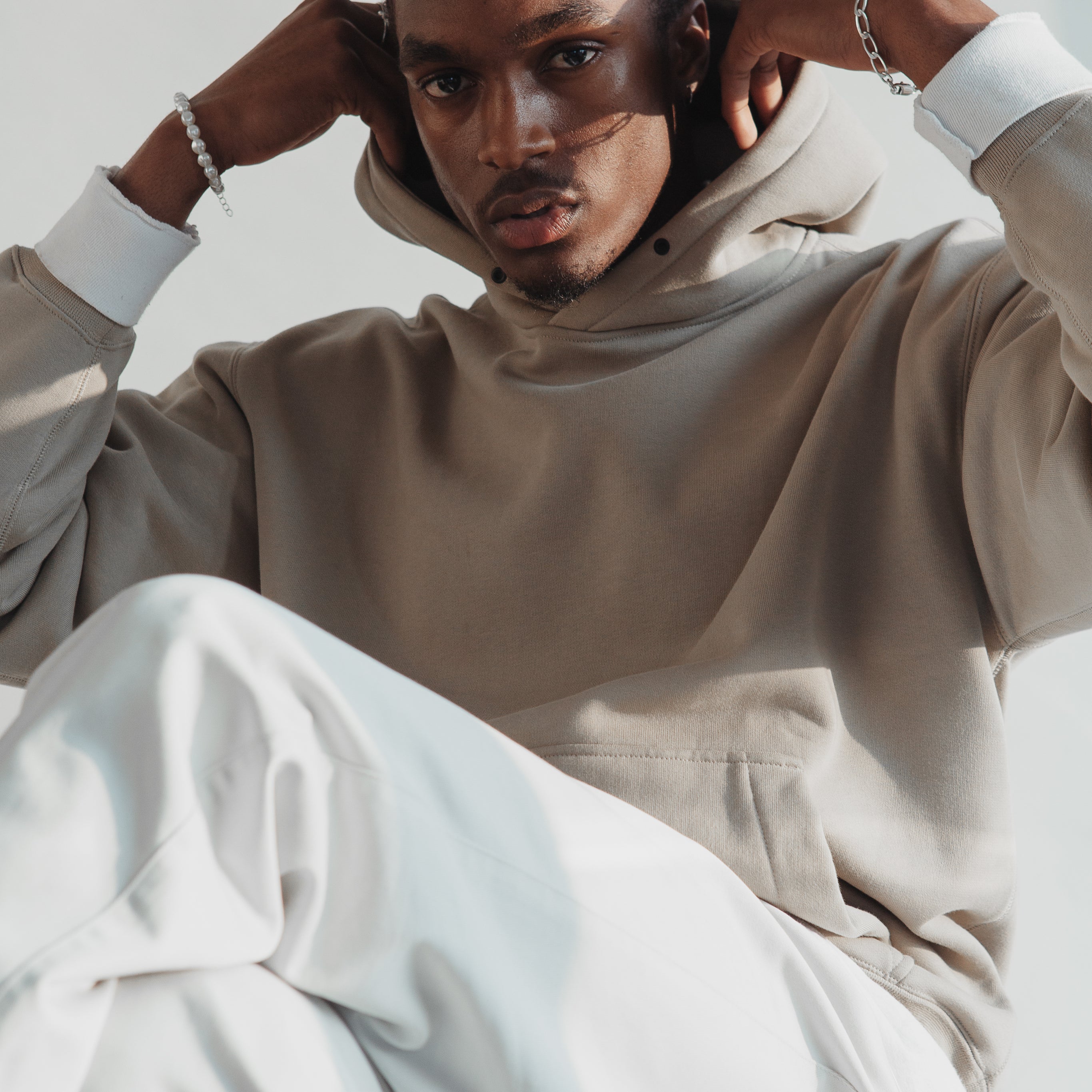 man-in-white-and-light-tan-outfit.jpg